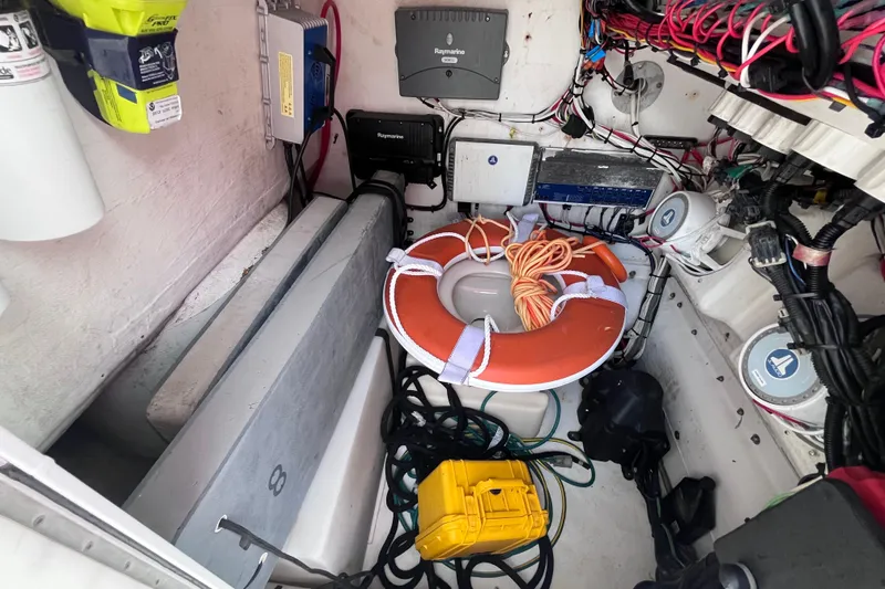Slide: The Image of 2004 Yellowfin 36 Offshore boat interior with safety equipment and wiring. - 39