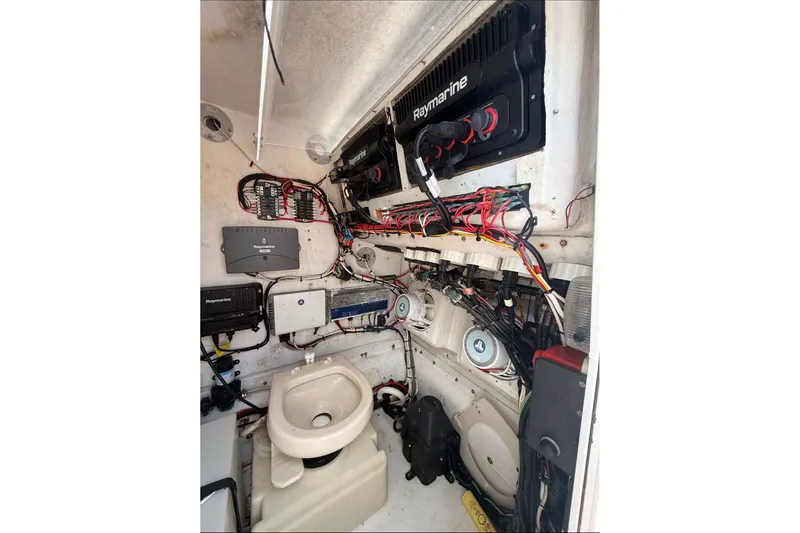 Slide: The Image of 2004 Yellowfin 36 Offshore boat interior with Raymarine electronics and wiring. - 5