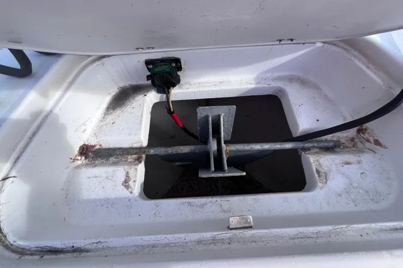 Slide: The Image of Anchor storage compartment on a 2004 Yellowfin 36 Offshore boat. - 52