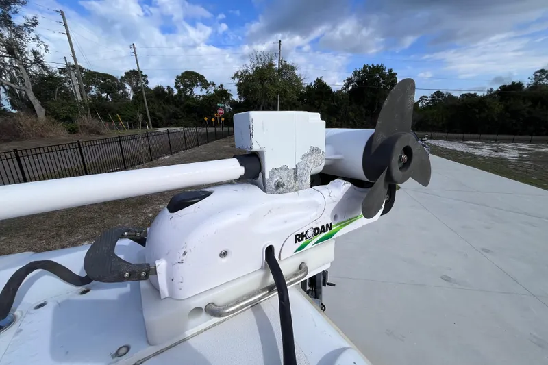 Slide: The Image of Rhodan trolling motor on 2004 Yellowfin 36 Offshore boat, parked outdoors. - 54