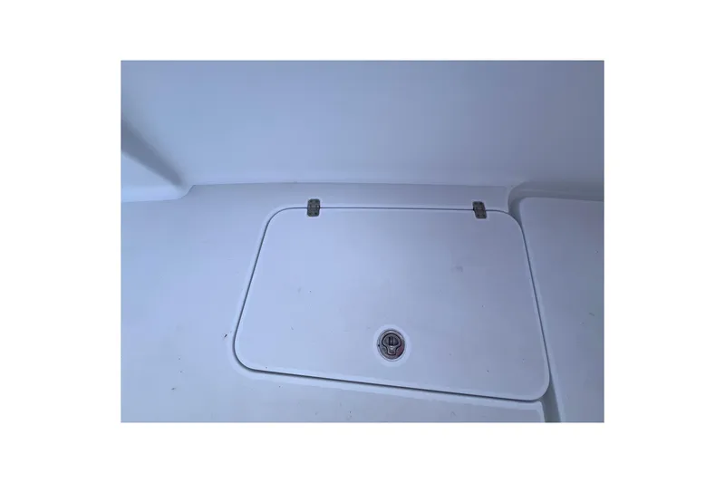 Slide: The Image of Hatch cover on 2004 Yellowfin 36 Offshore boat deck. - 62