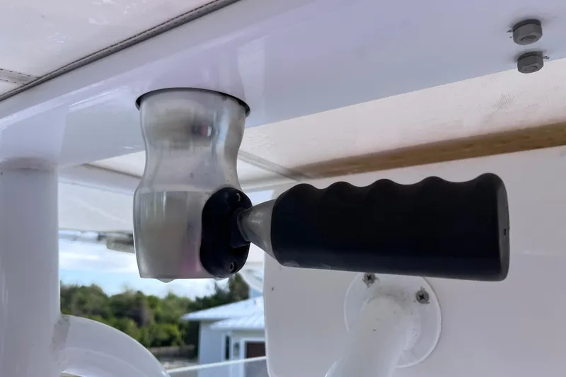 Slide: The Image of Close-up of a handle on a 2004 Yellowfin 36 Offshore boat. - 70