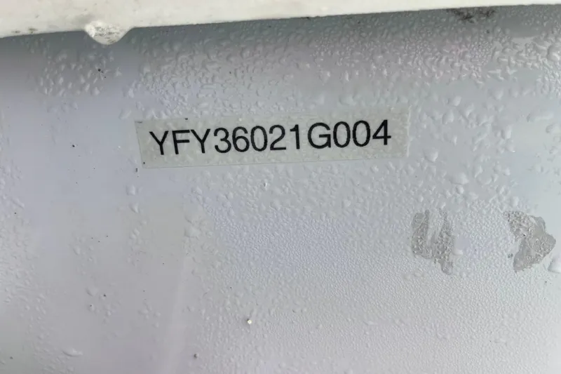 Slide: The Image of Hull identification number on a 2004 Yellowfin 36 Offshore boat. - 76