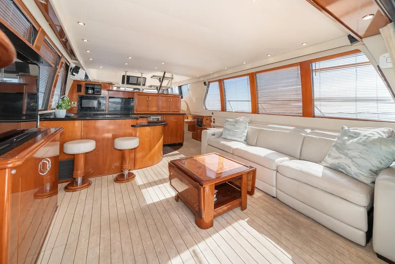 Slide: The Image of Luxurious interior of 2003 Carver 570 Voyager Pilothouse with elegant seating and modern amenities. - 32