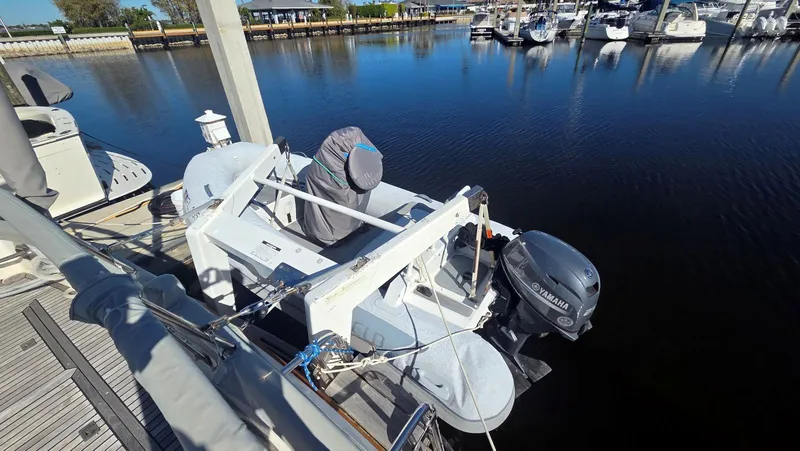 Slide: The Image of Grand Banks 49 Classic 1997 with Yamaha outboard motor at dock. - 18