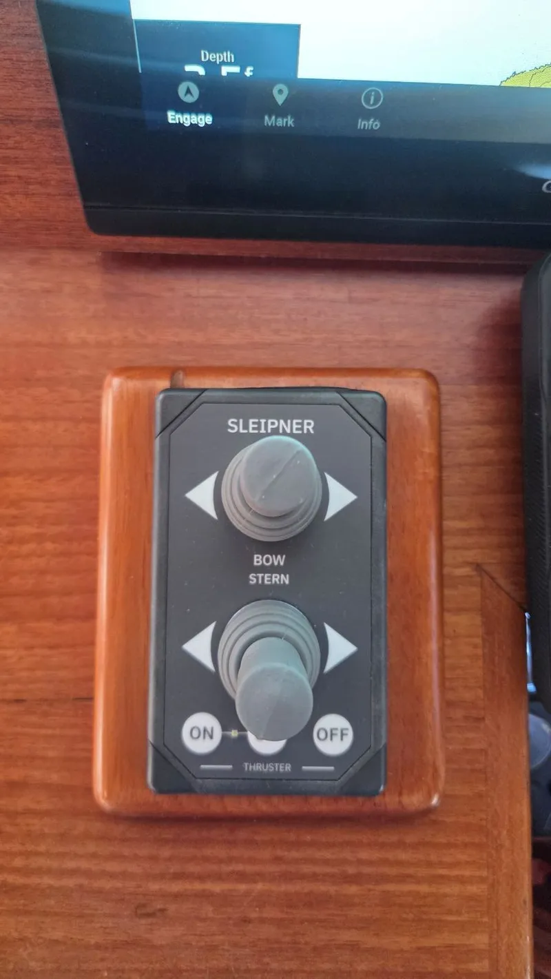 Slide: The Image of Control panel of a 1997 Grand Banks 49 Classic boat. - 35