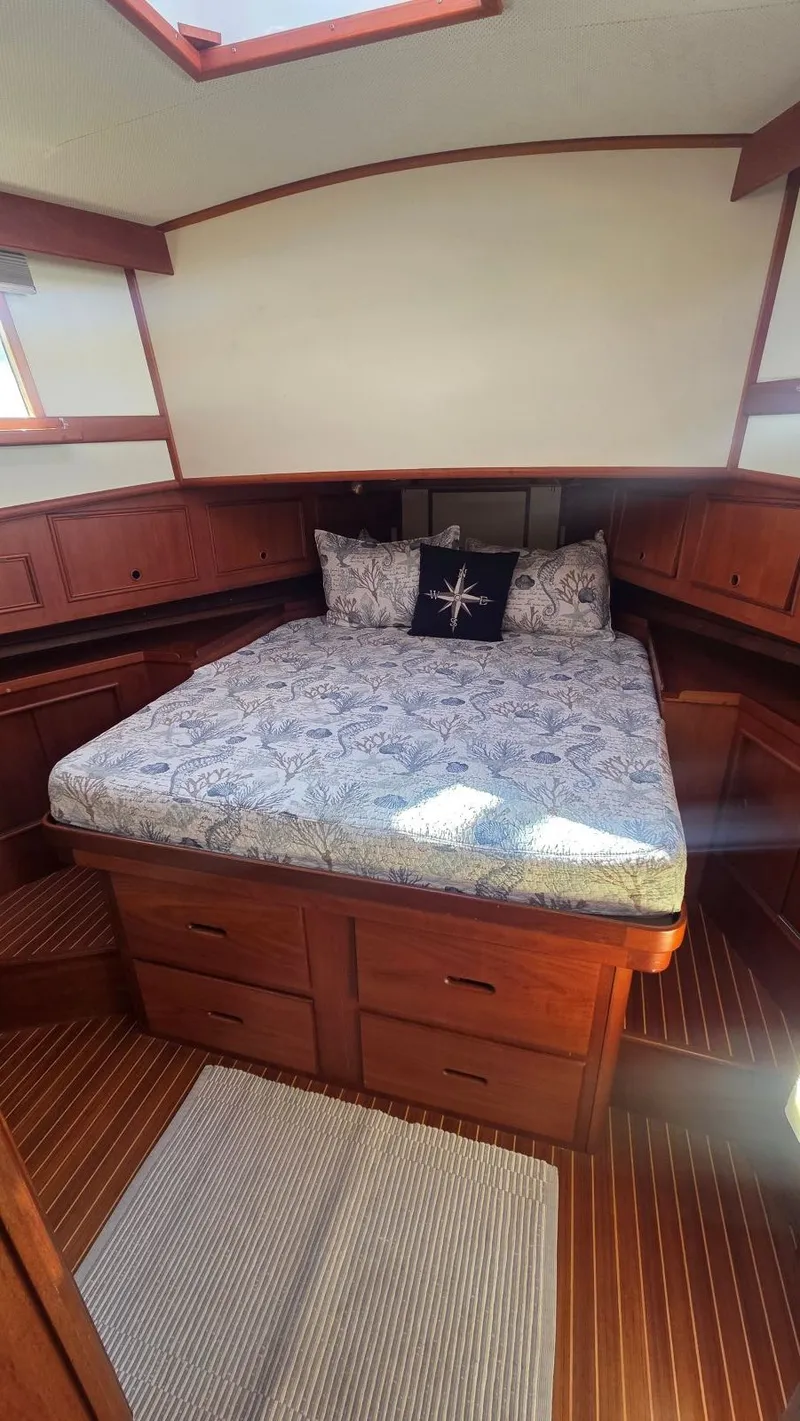 Slide: The Image of Interior of a 1997 Grand Banks 49 Classic yacht with cozy bedroom. - 45