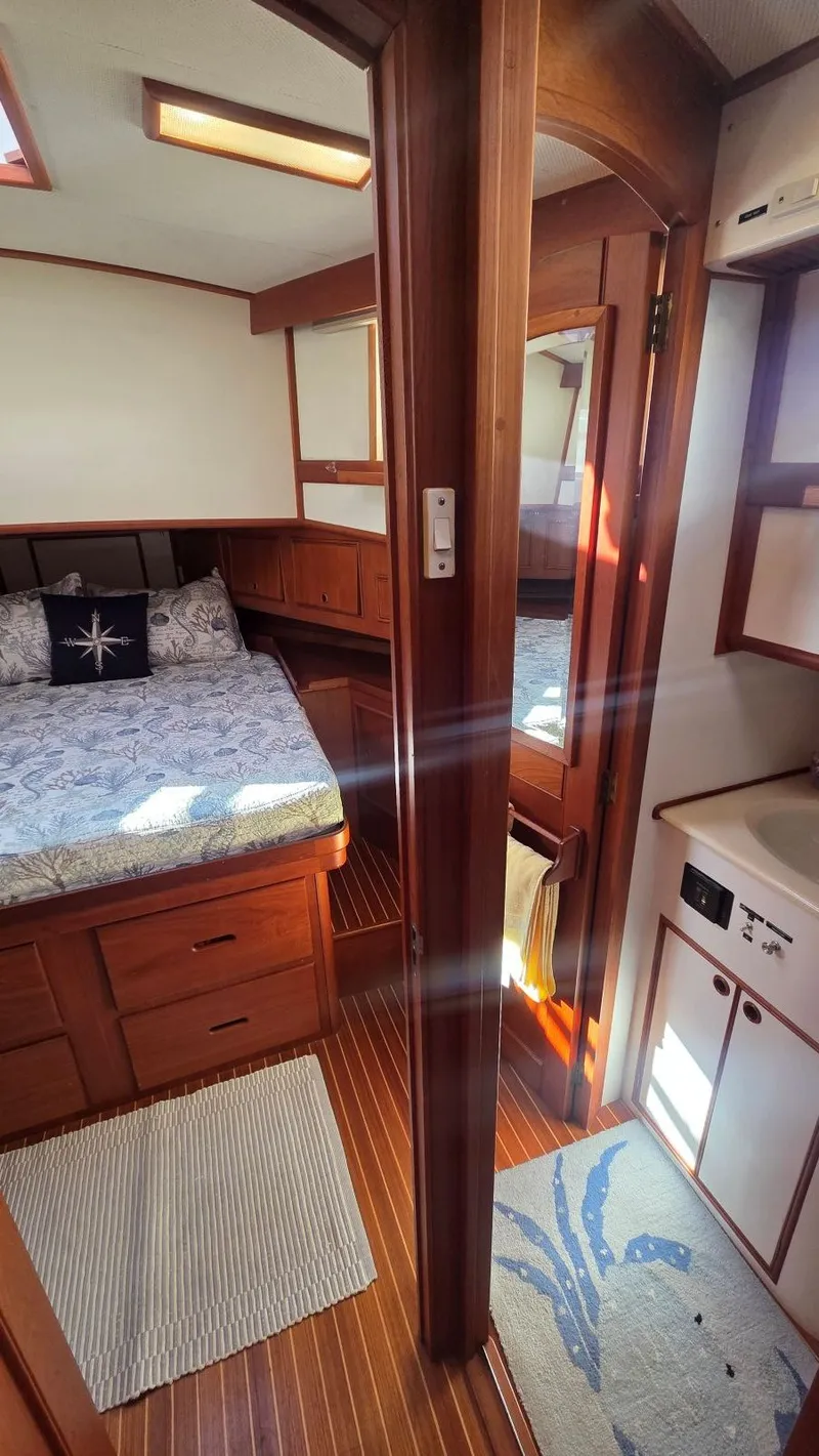 Slide: The Image of Interior of 1997 Grand Banks 49 Classic yacht, bedroom and bathroom. - 46