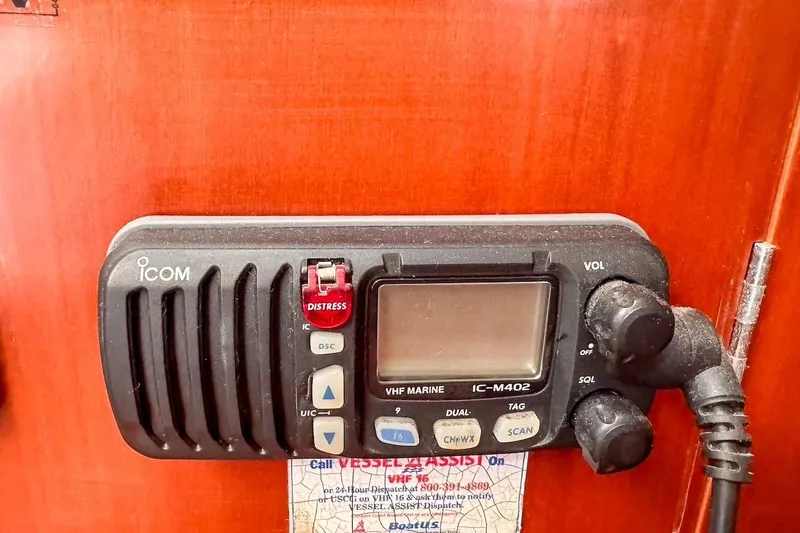 Slide: The Image of VHF marine radio on 2006 Beneteau 343 sailboat, featuring Icom IC-M402 model. - 31