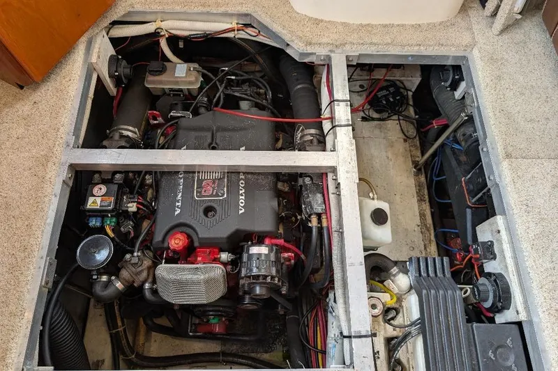 Slide: The Image of Engine compartment of a 2003 Carver 356 Motor Yacht, featuring a Volvo Penta engine. - 29