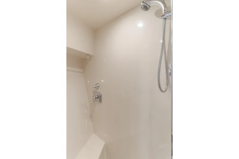Slide: The Image of Luxurious shower in 2006 West Bay 64 yacht, featuring sleek fixtures and modern design. - 33