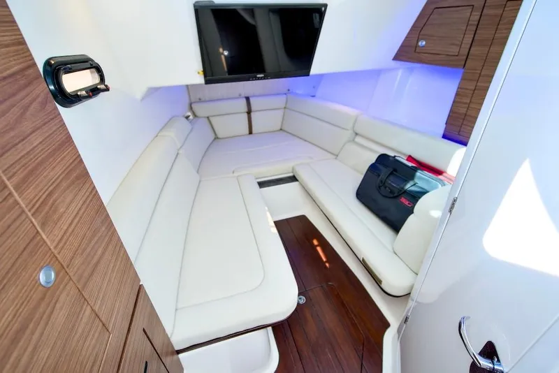Slide: The Image of Luxurious interior of 2019 Boston Whaler 350 Realm with plush seating and modern amenities. - 27