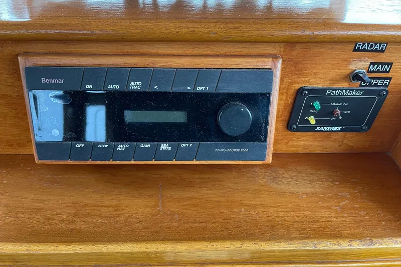 Slide: The Image of Control panel of a 1974 Grand Banks 42 Motoryacht with Benmar and Xantrex systems. - 31