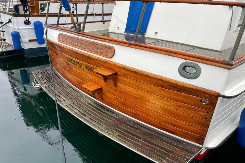 Slide: The Image of 1974 Grand Banks 42 Motoryacht "Edgebright" docked in Sequim, WA, with wooden transom. - 49