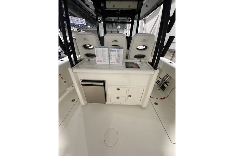 Slide: The Image of 2026 Cobia 350 Center Console interior with seating and storage compartments. - 17