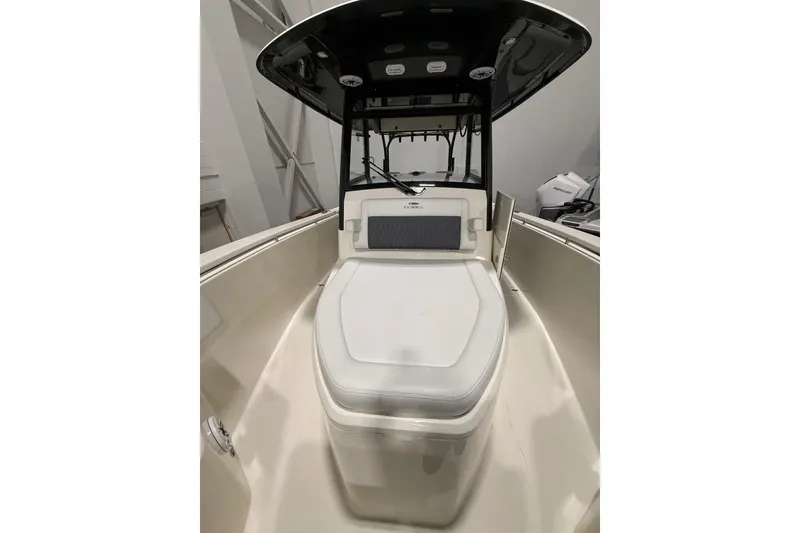 Slide: The Image of 2026 Cobia 350 Center Console boat interior with cushioned seating and sleek design. - 25