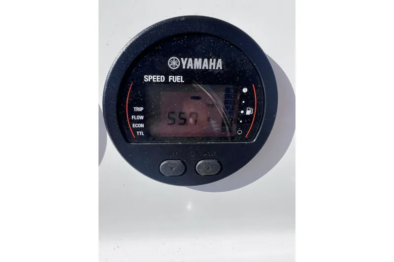 Slide: The Image of Yamaha speed fuel gauge on 1998 Cape Horn 23 Cape Bay boat dashboard. - 23