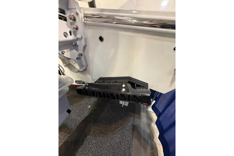 Slide: The Image of 2026 Cobia 305 Center Console boat detail, featuring a sleek transom design. - 3