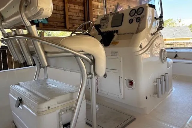 Slide: The Image of 2012 Seafox 220XT boat interior with helm, controls, and seating. - 4