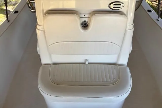 Slide: The Image of 2012 Seafox 220XT boat interior with white cushioned seating and sleek design. - 9