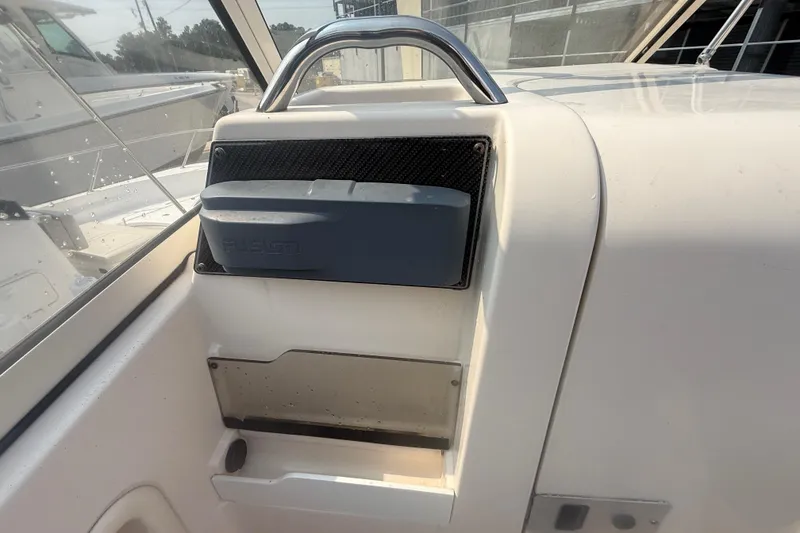 Slide: The Image of 2017 Grady-White Freedom 235 boat interior with Fusion audio system. - 31