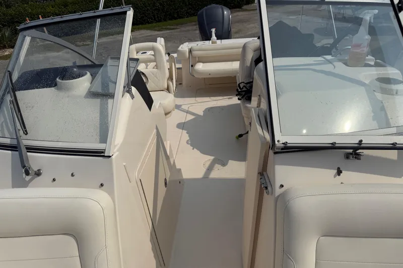 Slide: The Image of 2017 Grady-White Freedom 235 boat interior with dual consoles and seating. - 37