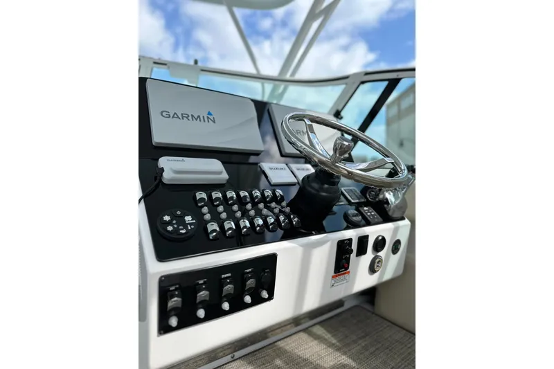 Slide: The Image of Helm of 2020 Stamas 326 Aegean boat with Garmin navigation system. - 3