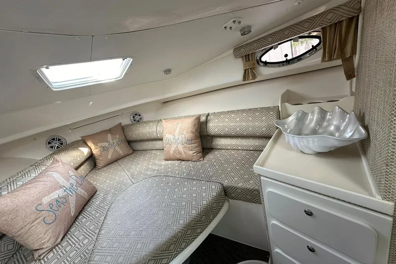 Slide: The Image of 2020 Stamas 326 Aegean cabin interior with cozy seating and decorative pillows. - 8