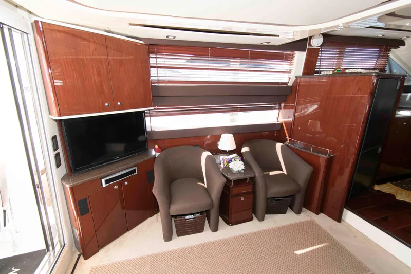Slide: The Image of Luxurious interior of 2013 Meridian 441 Sedan yacht with elegant seating and entertainment area. - 18