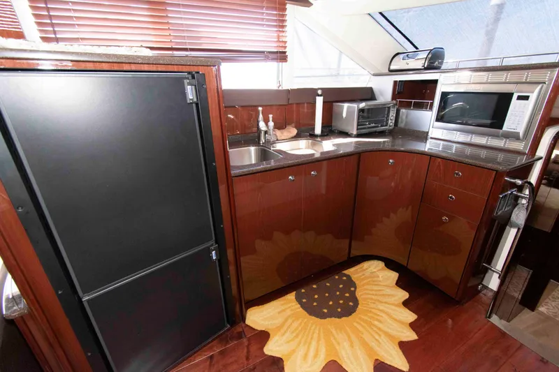 Slide: The Image of Luxurious kitchen interior of 2013 Meridian 441 Sedan yacht with modern appliances. - 20