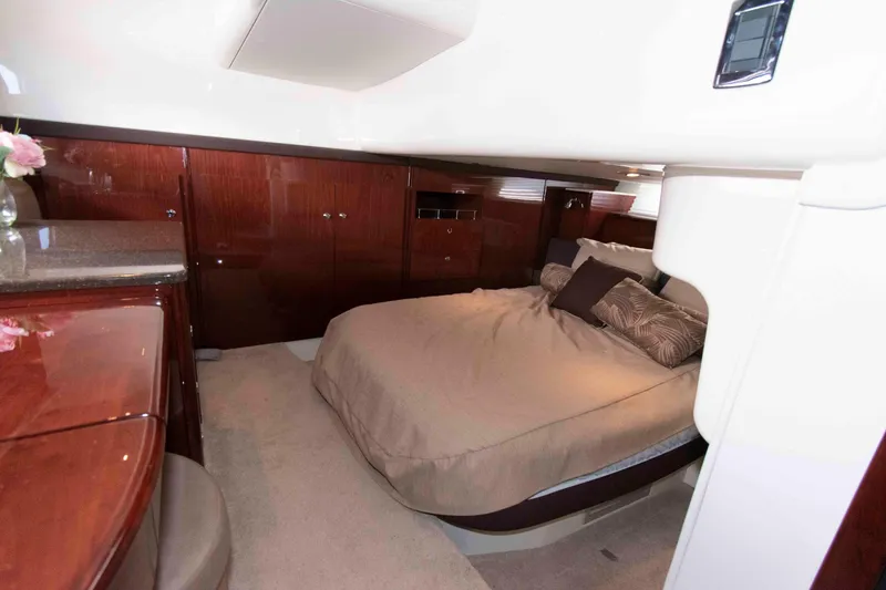 Slide: The Image of Luxurious cabin interior of 2013 Meridian 441 Sedan yacht with elegant wood finishes. - 22
