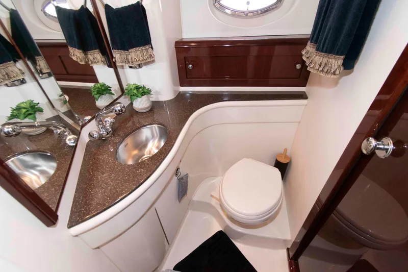 Slide: The Image of Luxurious bathroom in 2013 Meridian 441 Sedan yacht with elegant fixtures and decor. - 26