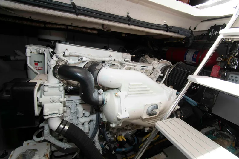 Slide: The Image of Engine room of a 2013 Meridian 441 Sedan yacht, showcasing mechanical components. - 30