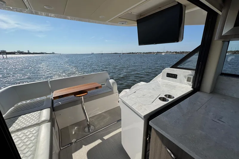 Slide: The Image of Interior view of 2021 Regal 38 XO yacht with ocean backdrop. - 20