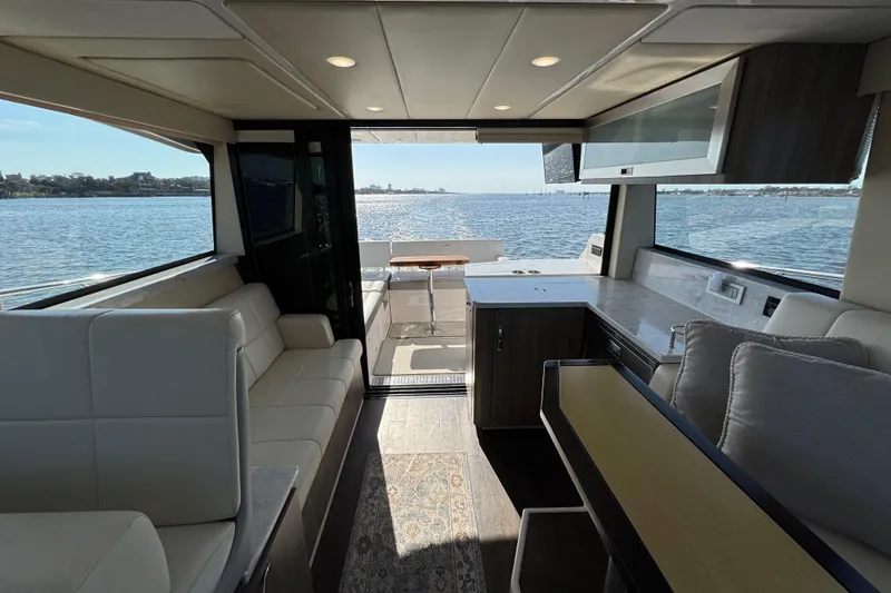 Slide: The Image of Luxurious interior of 2021 Regal 38 XO yacht with waterfront view. - 43