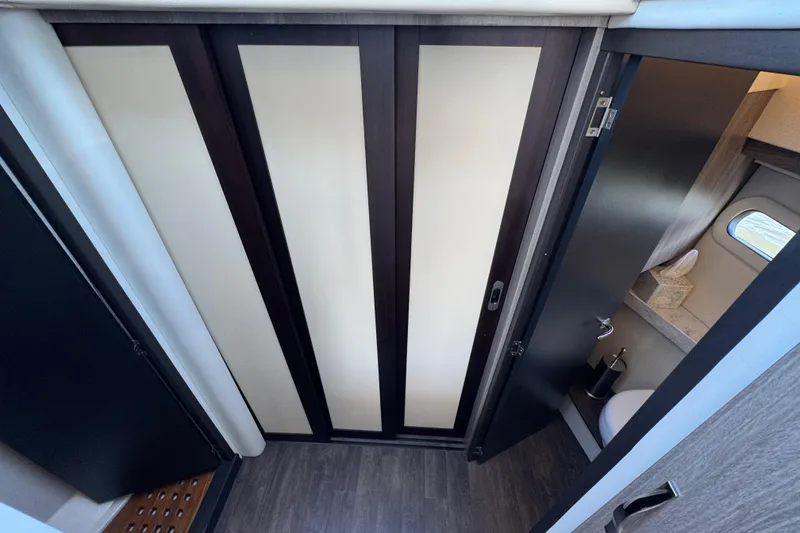 Slide: The Image of 2021 Regal 38 XO yacht interior with modern bathroom and sleek design. - 52