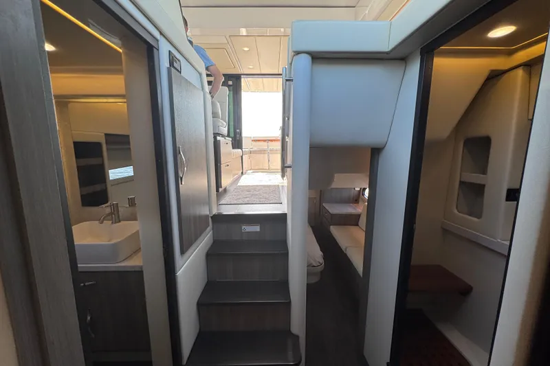 Slide: The Image of Interior view of 2021 Regal 38 XO yacht, featuring modern design and luxurious amenities. - 57