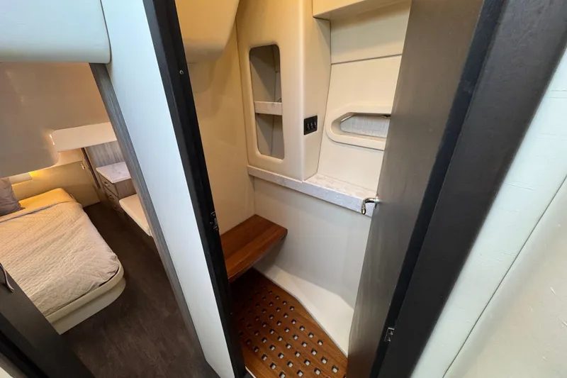 Slide: The Image of 2021 Regal 38 XO yacht interior with cozy cabin and modern amenities. - 68