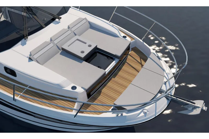 Slide: The Image of Manufacturer Provided Image: 2026 Jeanneau NC 1095 Fly Series 2 boat with spacious deck and seating area. - 2