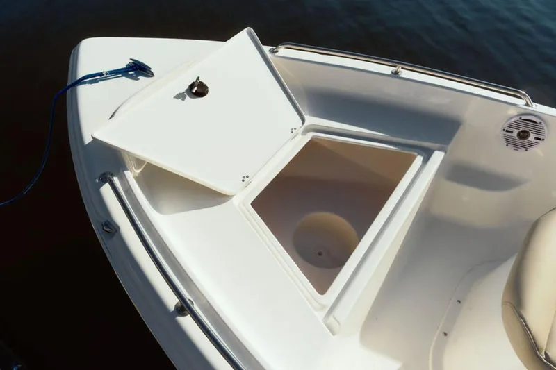 Slide: The Image of Manufacturer Provided Image: 2025 Key West 1720 Center Console boat with open storage compartment on deck. - 1