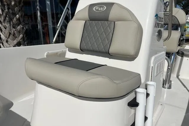 Slide: The Image of 2026 Key West 1720 Center Console boat seat with gray cushioned upholstery and rod holders. - 8