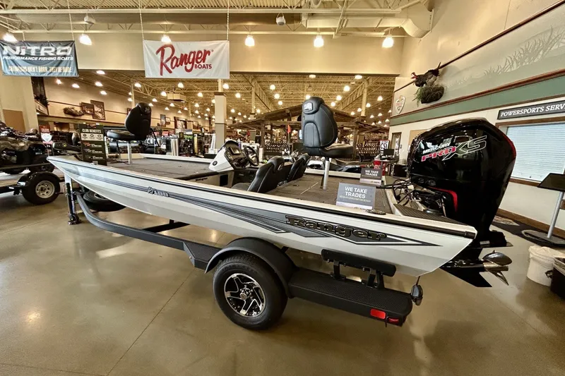 The Image of 2026 Ranger RT188 boat displayed indoors with Mercury Pro XS engine. - 0