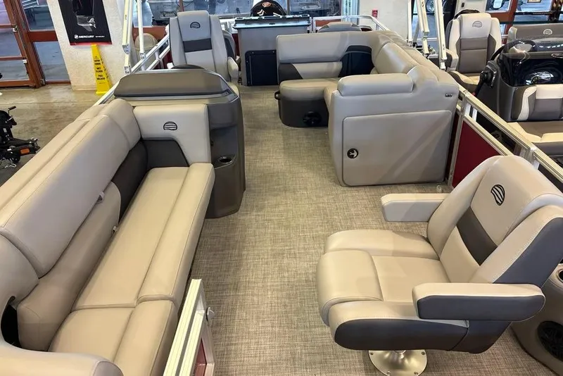 Slide: The Image of 2026 Sun Tracker SportFish 20 DLX interior with plush seating and modern design. - 2