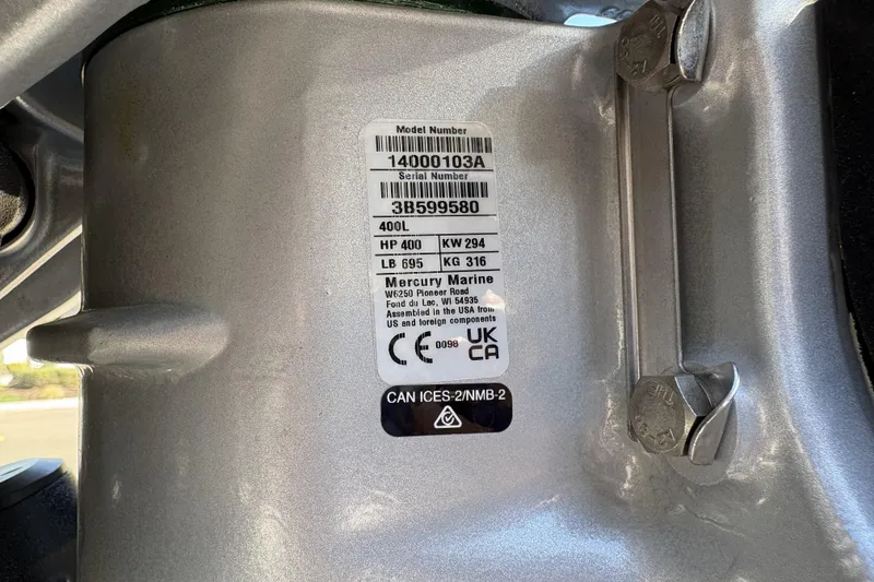 Slide: The Image of Label on a 2026 Regency 250 DL engine, displaying model and serial numbers. - 122