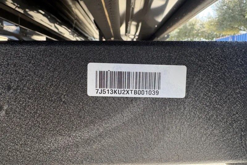 Slide: The Image of Barcode label on Regency 250 DL, 2026 model, displaying serial number. - 123