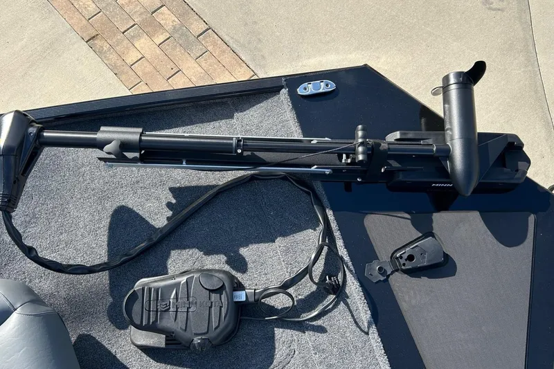 Slide: The Image of 2026 Tracker Bass Tracker Classic XL boat with Minn Kota trolling motor on deck. - 11