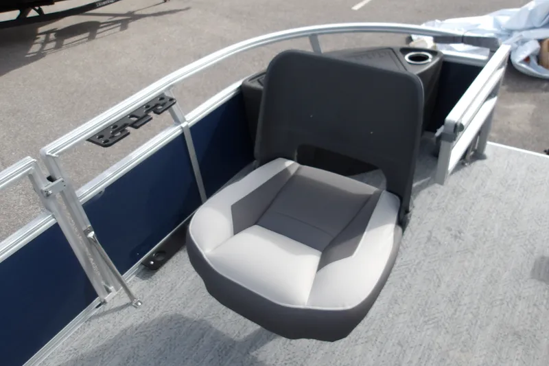 Slide: The Image of 2026 Sun Tracker Bass Buggy 18 DLX boat seat, gray and black, on deck. - 22