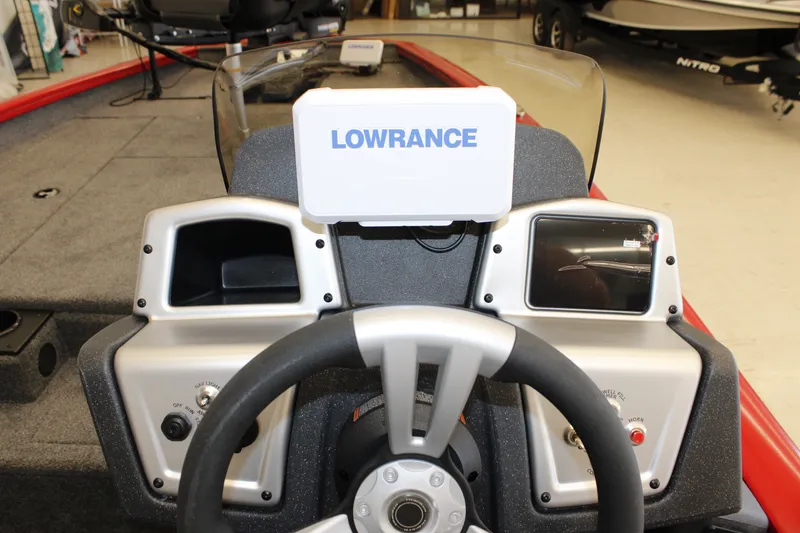 Slide: The Image of 2026 Tracker Pro Team 190 boat dashboard with Lowrance navigation system. - 12