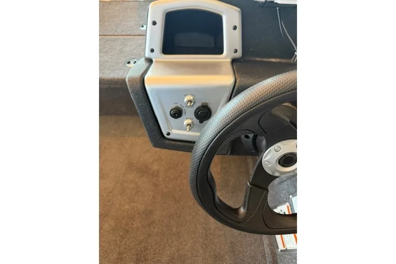 Slide: The Image of Steering console of 2026 Tracker Pro Team 175 Crappie Edition boat. - 13