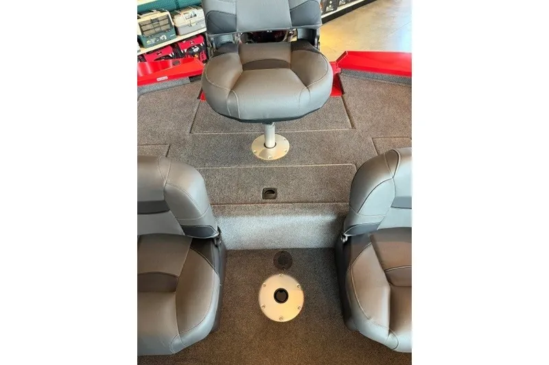 Slide: The Image of 2026 Tracker Pro Team 175 Crappie Edition boat interior with three gray seats. - 17